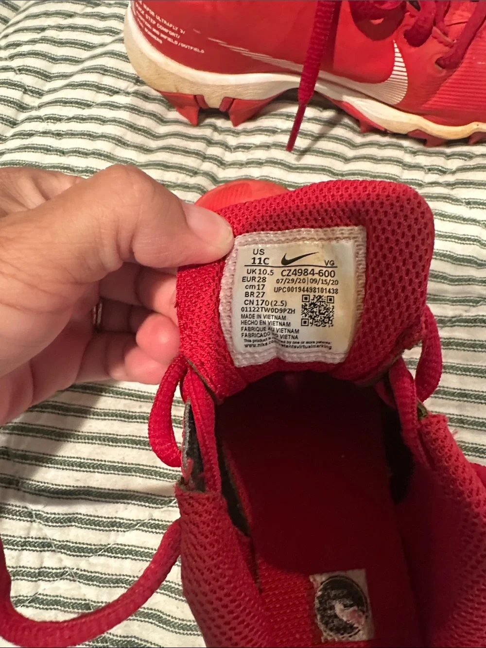 Nike Kids Red and White Baseball Cleats